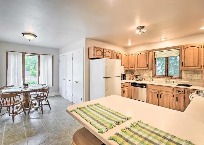 Walkable Lake Elkhart Apt: Dine, Shop, Swim!